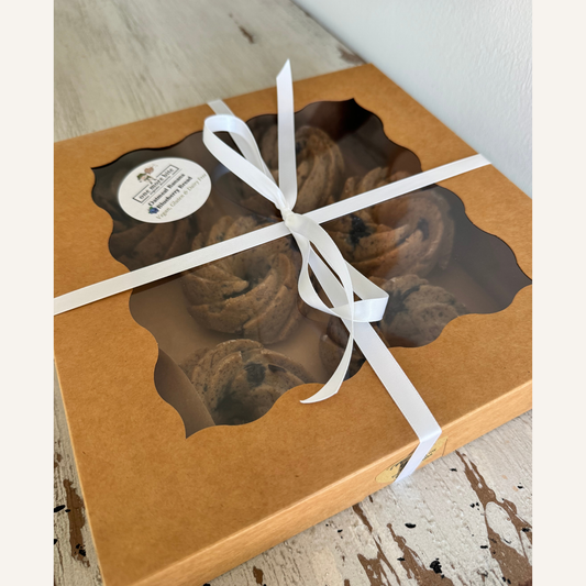 Oatmeal banana blueberry mini bundt cakes ready for gifting in box with ribbon