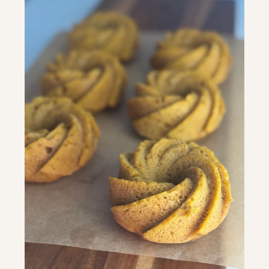 Pumpkin mini bundt cakes arranged for events, sold by the dozen