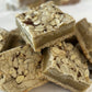 Awesome Almond Bars in a stack from One More Bite Organic Desserts. Organic, peanut-free, soy-free, corn-free decadent treats.
