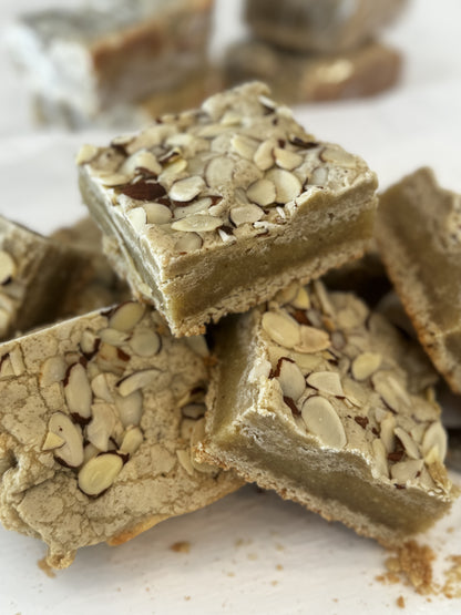 Awesome Almond Bars in a stack from One More Bite Organic Desserts. Organic, peanut-free, soy-free, corn-free decadent treats.