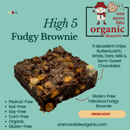 Promotional graphic for a 'High 5 Fudgy Brownie' from One More Bite Organic, showing a large, rich chocolate brownie square on a teal background with product details, ingredients, and an 'ORDER NOW!' call to action.