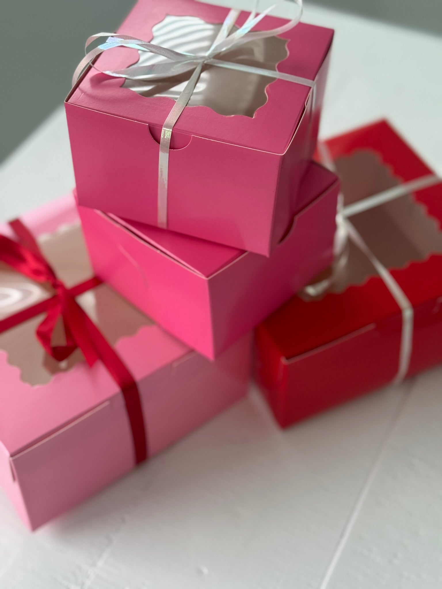 Stack of pink & red Valentine gift boxes