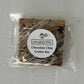 Packaged chocolate chip cookie bar with One More Bite Organic Desserts  branding on a white background. Organic peanut-free chocolate chip cookie bar party pack – soy-free, corn-free dessert handmade in Fort Myers, Florida.