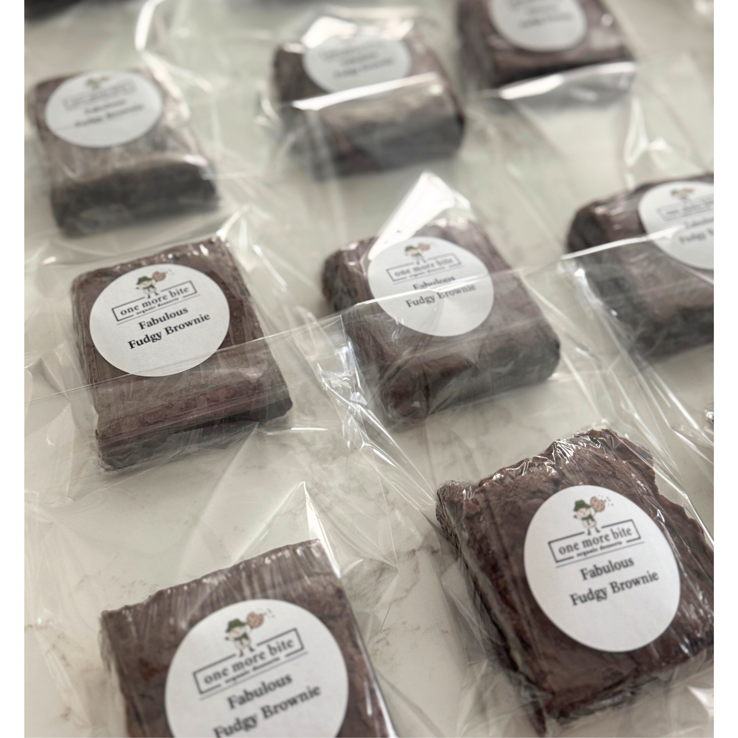 Individually packaged organic fudgy brownies from One More Bite Organic Desserts, peanut-free and allergen-friendly, available at Southwest Florida pop-up events 