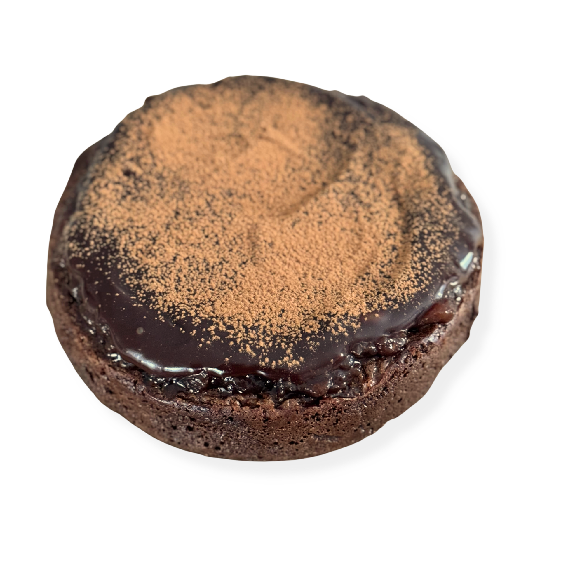 Photo of organic peanut-free chocolate flourless cake with ganache and dusted cooca powder and organic raspberry jam – soy-free, corn-free gluten-free dessert handmade in Fort Myers, Florida.