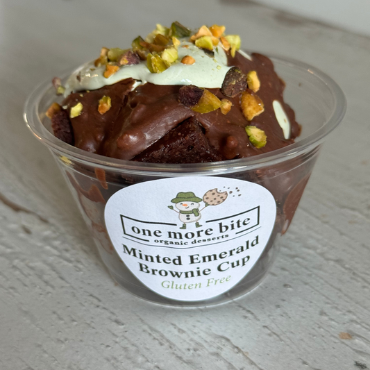 Photo of organic peanut-free brownie dessert cup with minted matcha marshmallow and chopped pistachio nuts – soy-free, corn-free gluten-free dessert handmade in Fort Myers, Florida.