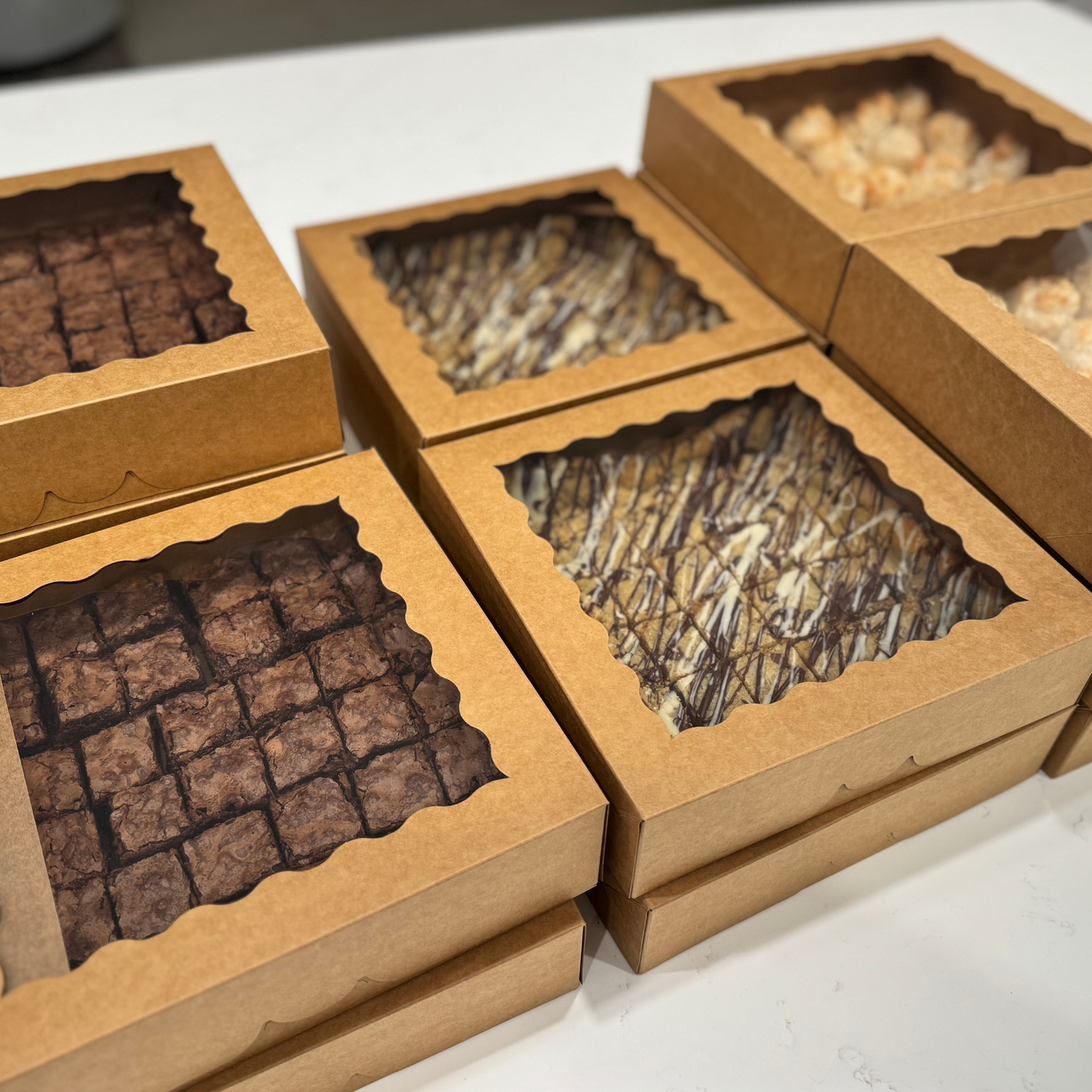 Organic peanut-free party and event platters; bulk boxes of dessert bites like fudgy brownies, chocolate chip cookie bars, and coconut macaroons; soy-free, corn-free dessert handmade in Fort Myers, Florida.