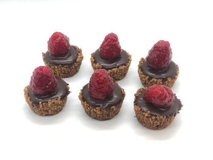 Six 1.5" raspberry pecan tart bites