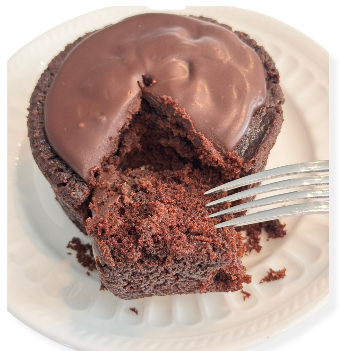 Photo of organic, peanut-free, nut-free, dairy-free, vegan chocolate cake with coconut chocolate ganache – soy-free, corn-free happy birthday celebration dessert handmade in Fort Myers, Florida.