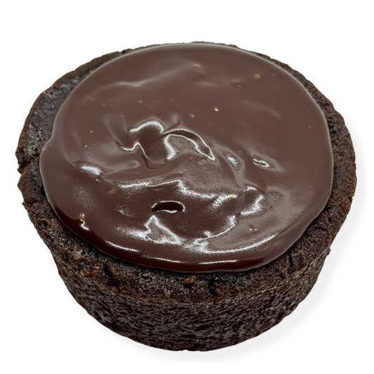 Photo of organic, peanut-free, nut-free, dairy-free, vegan chocolate cake with coconut chocolate ganache – soy-free, corn-free happy birthday celebration dessert handmade in Fort Myers, Florida.