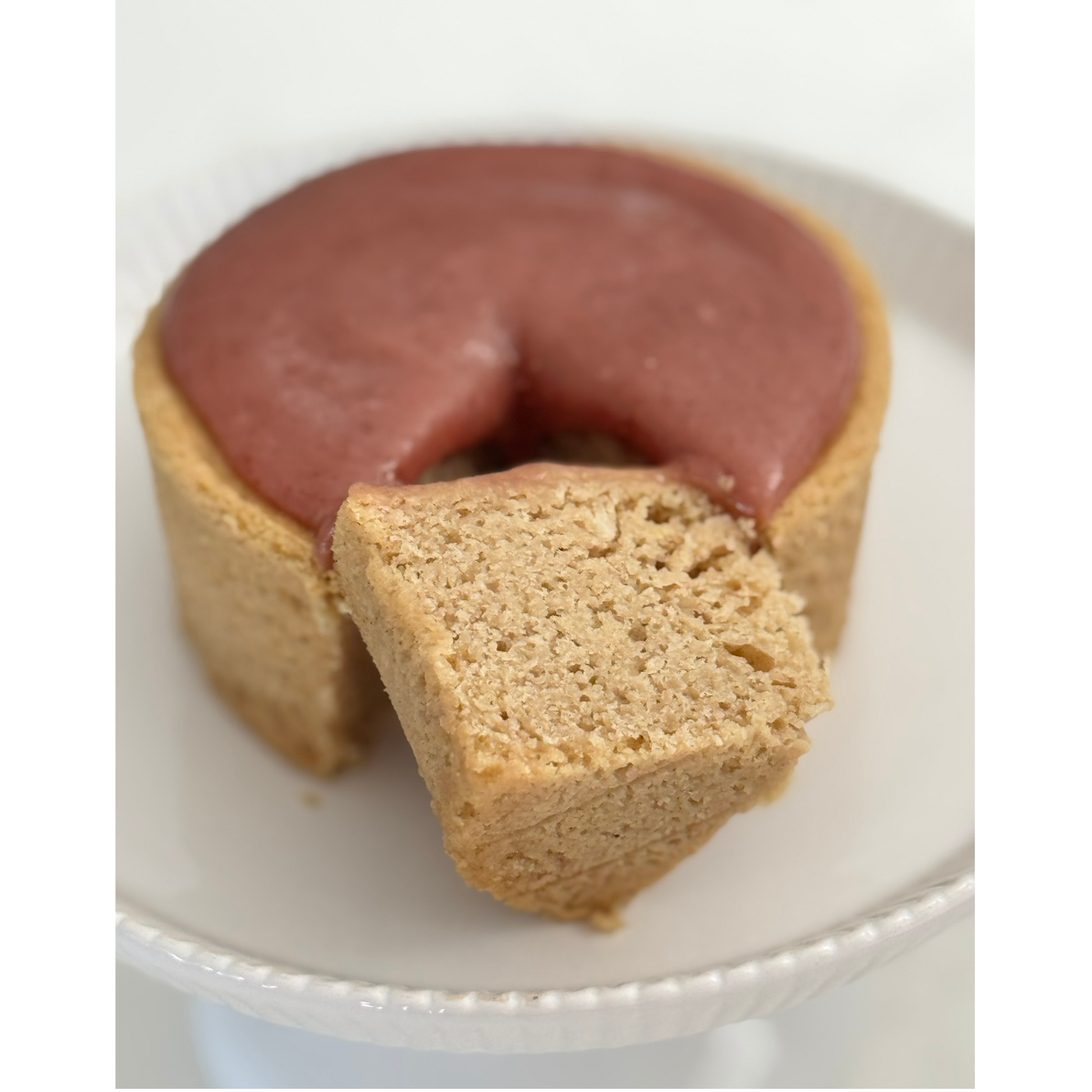 Photo of organic, peanut-free, gluten-free, dairy-free, vegan vanilla cake with raspberry ganache frosting – soy-free, corn-free happy birthday celebration dessert handmade in Fort Myers, Florida.