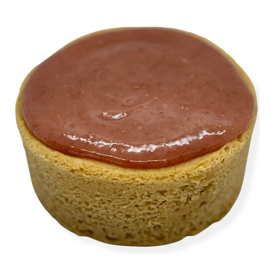 Photo of organic, peanut-free, gluten-free, dairy-free, vegan vanilla cake with raspberry ganache frosting – soy-free, corn-free happy birthday celebration dessert handmade in Fort Myers, Florida.